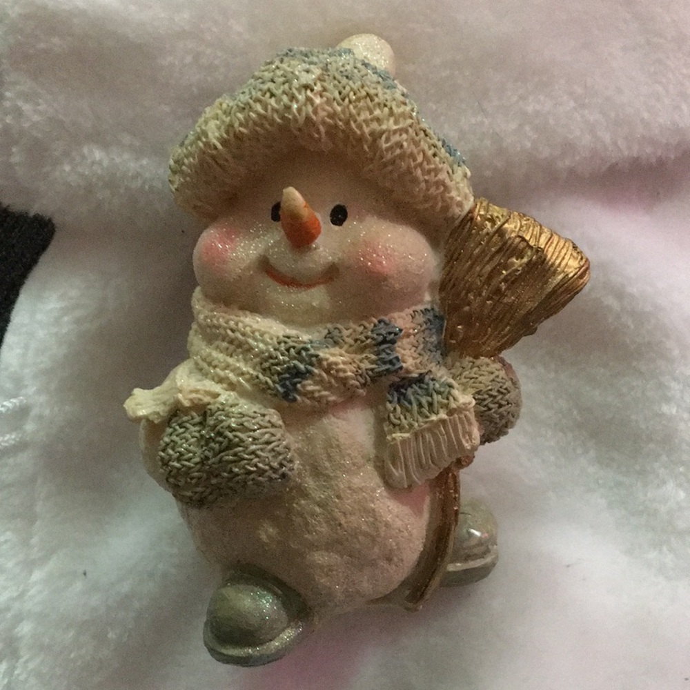 Festive Snowman Figurine with Gold and Cream Accents